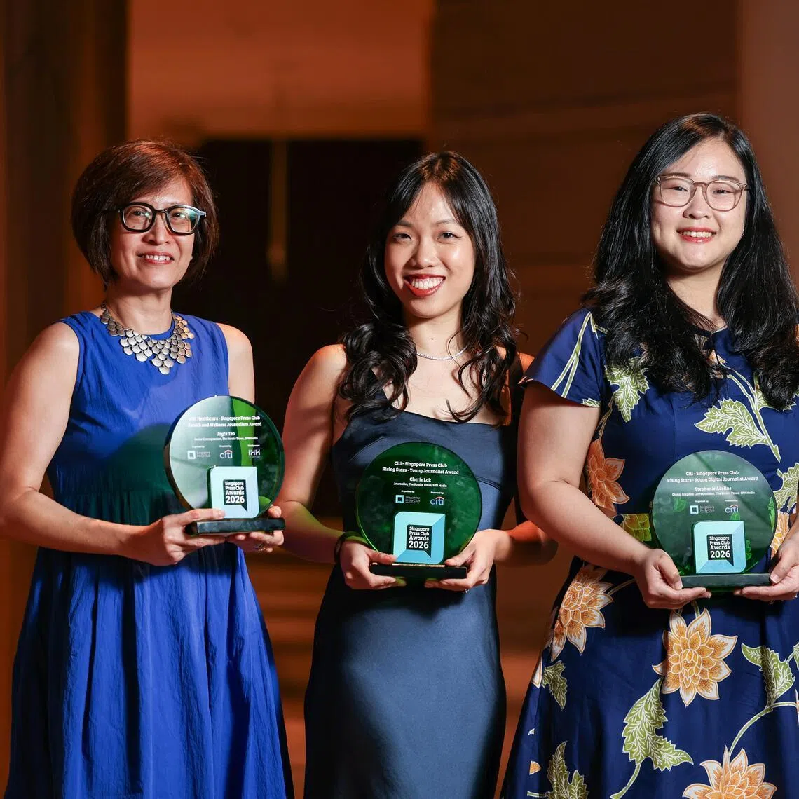 (From left) Straits Times senior correspondent Joyce Teo, journalist Cherie Lok and digital graphics correspondent Stephanie Adeline with their Singapore Press Club awards.