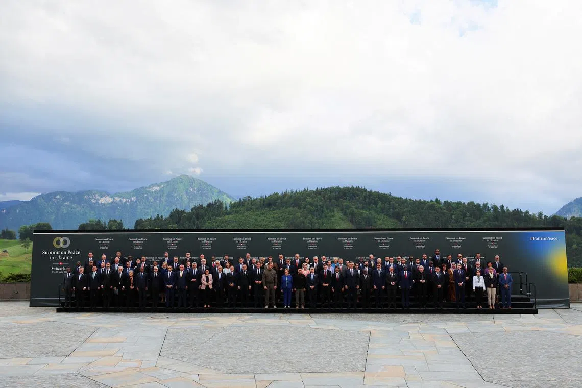 Swiss Federal President Viola Amherd, Ukrainian President Volodymyr Zelenskiy, U.S. Vice President Kamala Harris, Canadian Prime Minister Justin Trudeau, European Commission President Ursula von der Leyen, European Council President Charles Michel, British Prime Minister Rishi Sunak, French President Emmanuel Macron, German Chancellor Olaf Scholz, Dutch Prime Minister Mark Rutte, Portuguese President Marcelo Rebelo de Sousa, Croatian Prime Minister Andrej Plenkovic, Greek Prime Minister Kyriakos Mitsotakis, Czech President Petr Pavel, Chilean President Gabriel Boric, Argentinian President Javier Milei, Spanish Prime Minister Pedro Sanchez, Polish President Andrzej Duda and other leaders pose for a family photo, on the day of the opening ceremony of the Summit on Peace in Ukraine at the Buergenstock Resort in Stansstad near Lucerne, Switzerland, June 15, 2024. REUTERS/Denis Balibouse