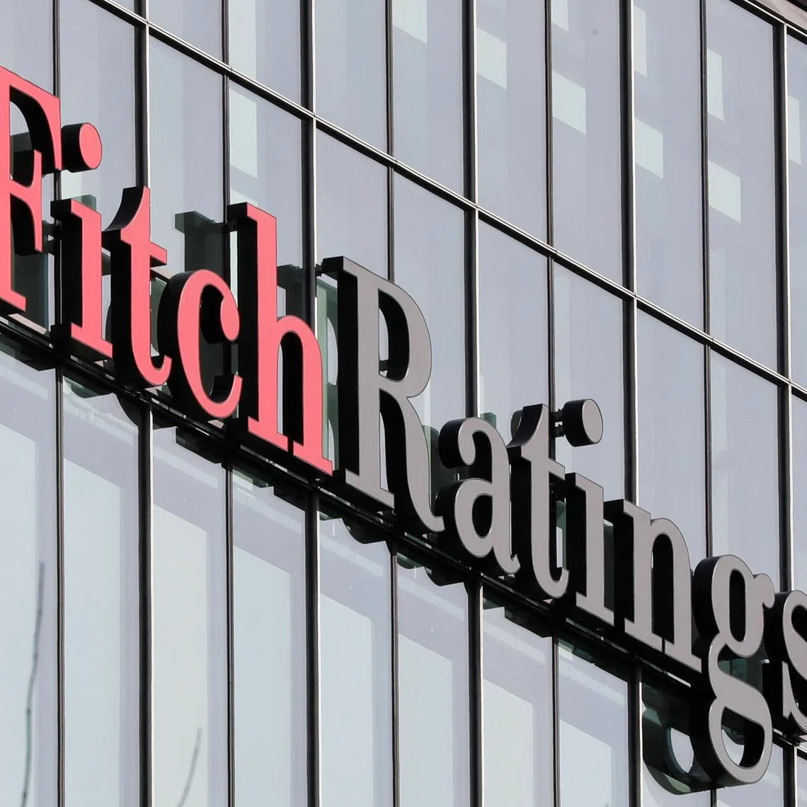 FILE PHOTO: The Fitch Ratings logo is seen at their offices at Canary Wharf financial district in London,Britain, March 3, 2016.  REUTERS/Reinhard Krause/File Photo