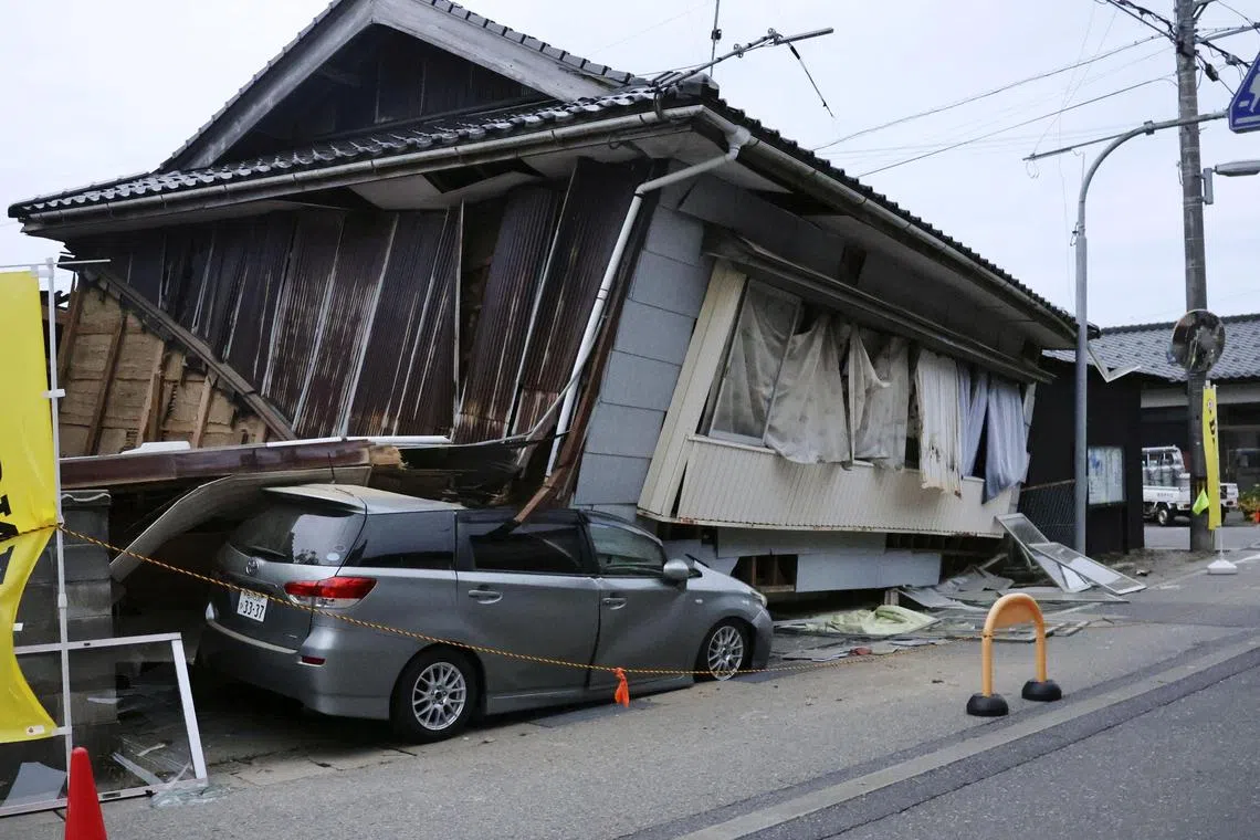 A collapsed house is seen in the aftermath of an earthquake in Suzu, Ishikawa prefecture, on May 5, 2023.