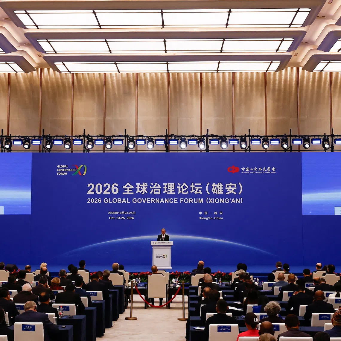 Chinese Foreign Minister Wang Yi delivers the speech during the opening ceremony for the inaugural Global Governance Forum in Xiongan New Area, Hebei province, China, October 23, 2026. REUTERS/Maxim Shemetov