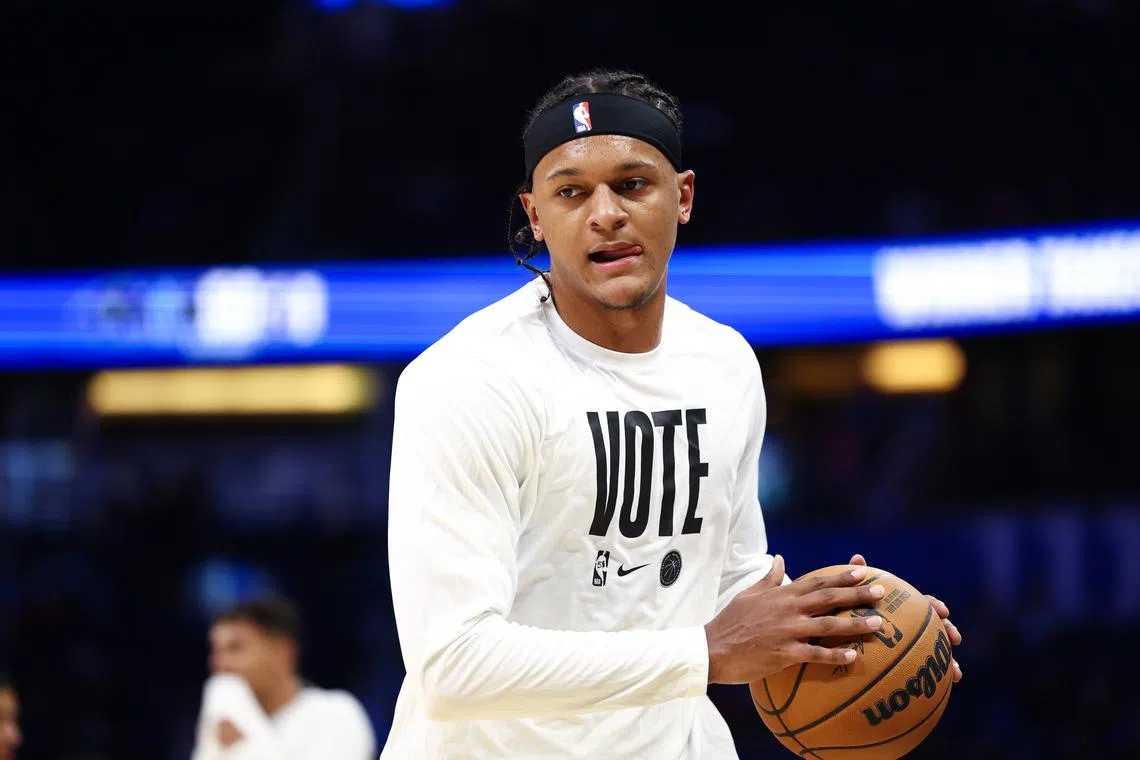 FILE PHOTO: Oct 28, 2024; Orlando, Florida, USA; Orlando Magic forward Paolo Banchero (5) warms up before a game against the Indiana Pacers at Kia Center. Mandatory Credit: Nathan Ray Seebeck-Imagn Images/File Photo