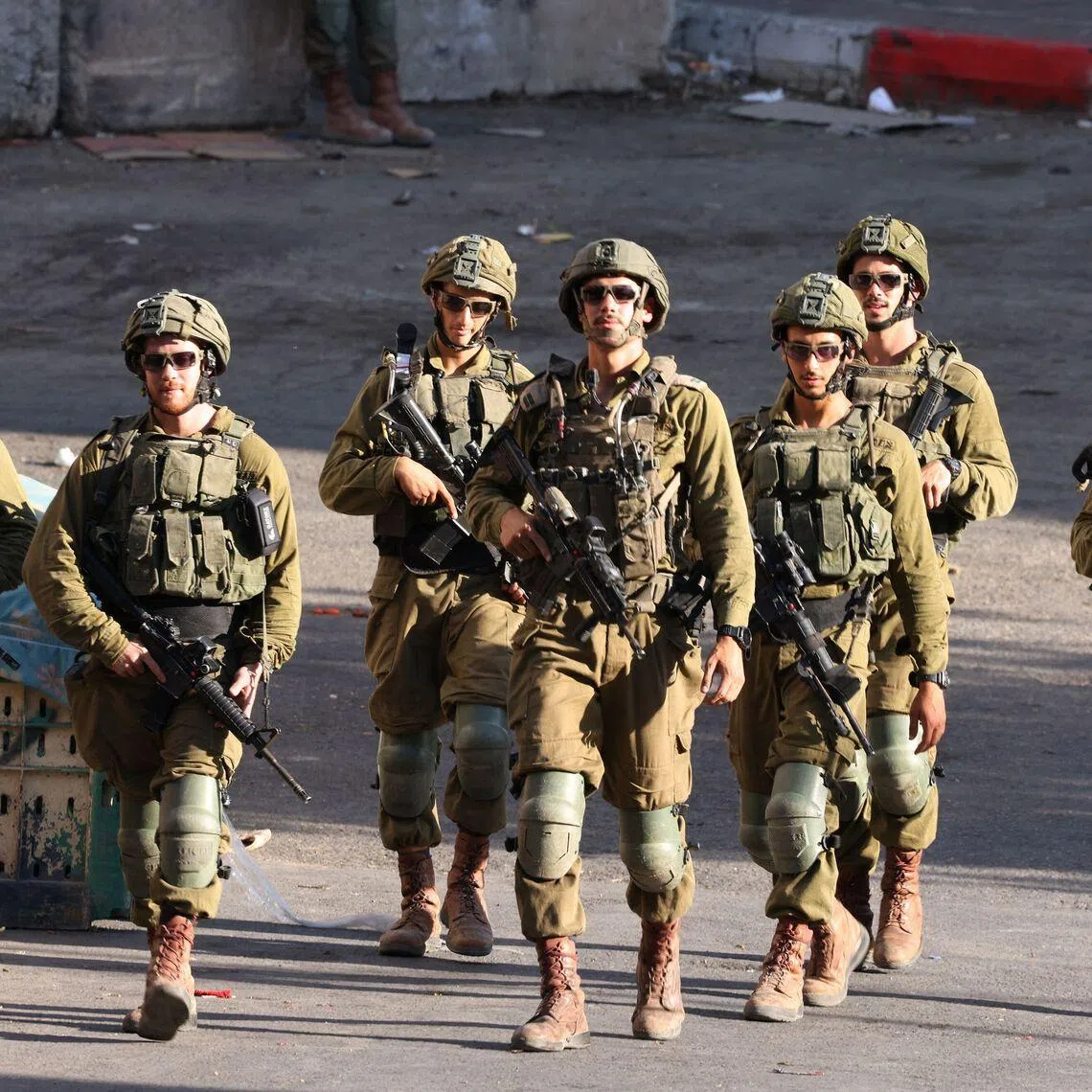 Israeli security forces patrolling a street in the occupied West Bank on July 23.