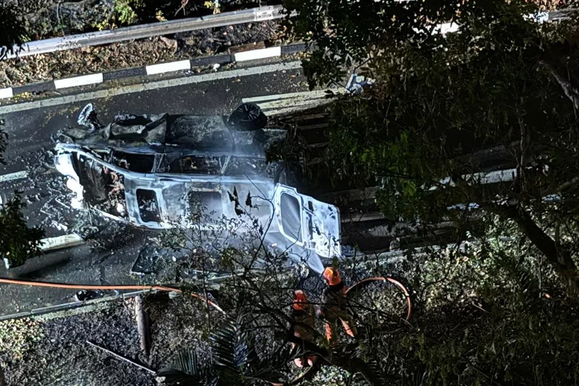 SCDF extinguished the blazing wreck of the luxury car with a water jet. 