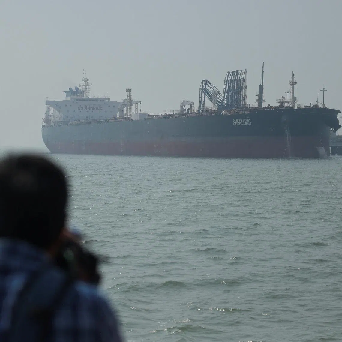 A tanker arrives at a port after transiting the Strait of Hormuz amid supply disruptions linked to the U.S-Israeli conflict with Iran, in Mumbai, on March 12.