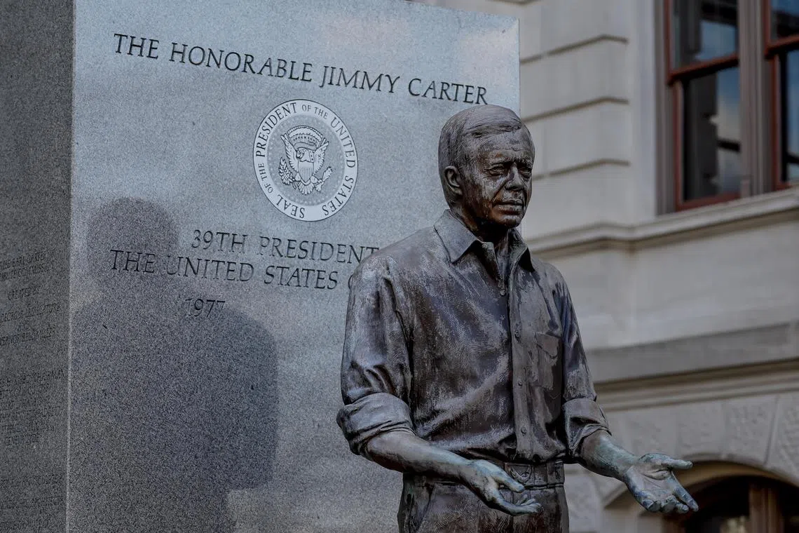 A statue of the late US President Jimmy Carter on the grounds of Georgia State Capitol, on Jan 3.