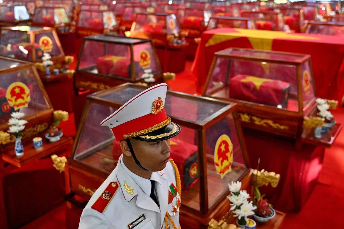 Caskets containing the remains of fallen soldiers at Le Thi Rieng Park in Ho Chi Minh City on Oct 14.