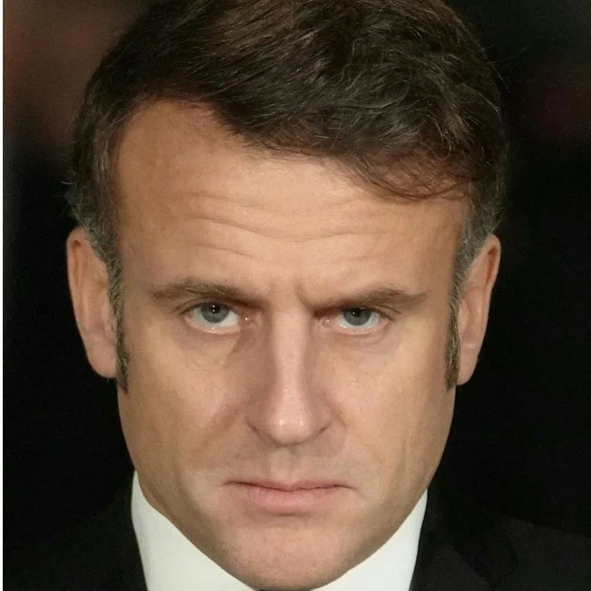 Mr Emmanuel Macron (left) does not plan to accept the invitation, a person close to the French leader said earlier. 