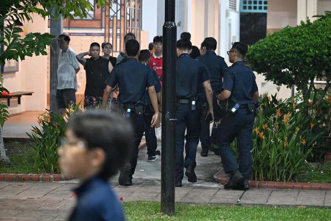 Police arrive at the basketball court at 6 Lorong Lew Lian where Canadian basketball influencer Matt Kiatipis is playing on Oct 7, 2026.