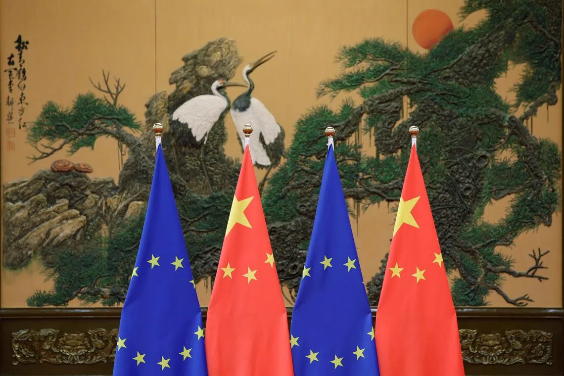 Flags of European Union and China are pictured during the China-EU summit at the Great Hall of the People in Beijing, China, July 12, 2016. REUTERS/Jason Lee/File Photo