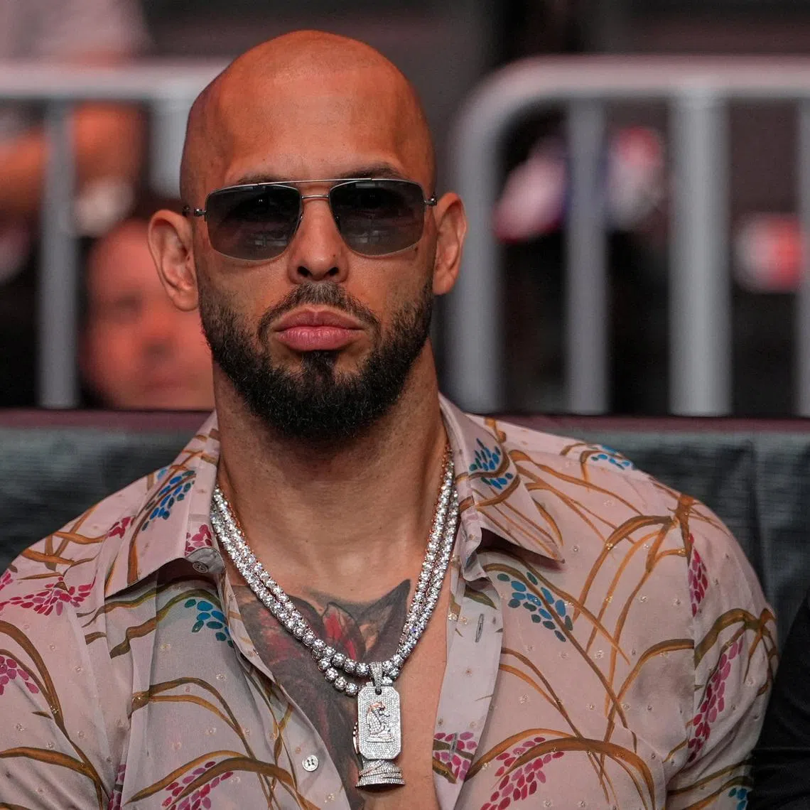 Andrew Tate arrives before U.S. President Donald Trump to attend UFC 327 at Kaseya Center, Miami, U.S., April 11, 2026. Julia Demaree Nikhinson/Pool via REUTERS