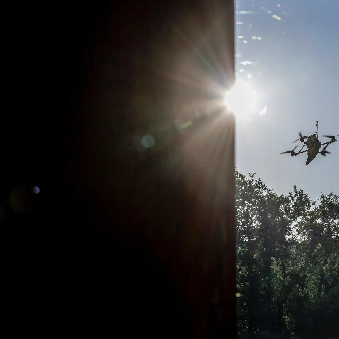 A Ukrainian first-person view (FPV) drone flies near a Russian border in a Kharkiv region, Ukraine June 14, 2024. REUTERS/Viacheslav Ratynskyi