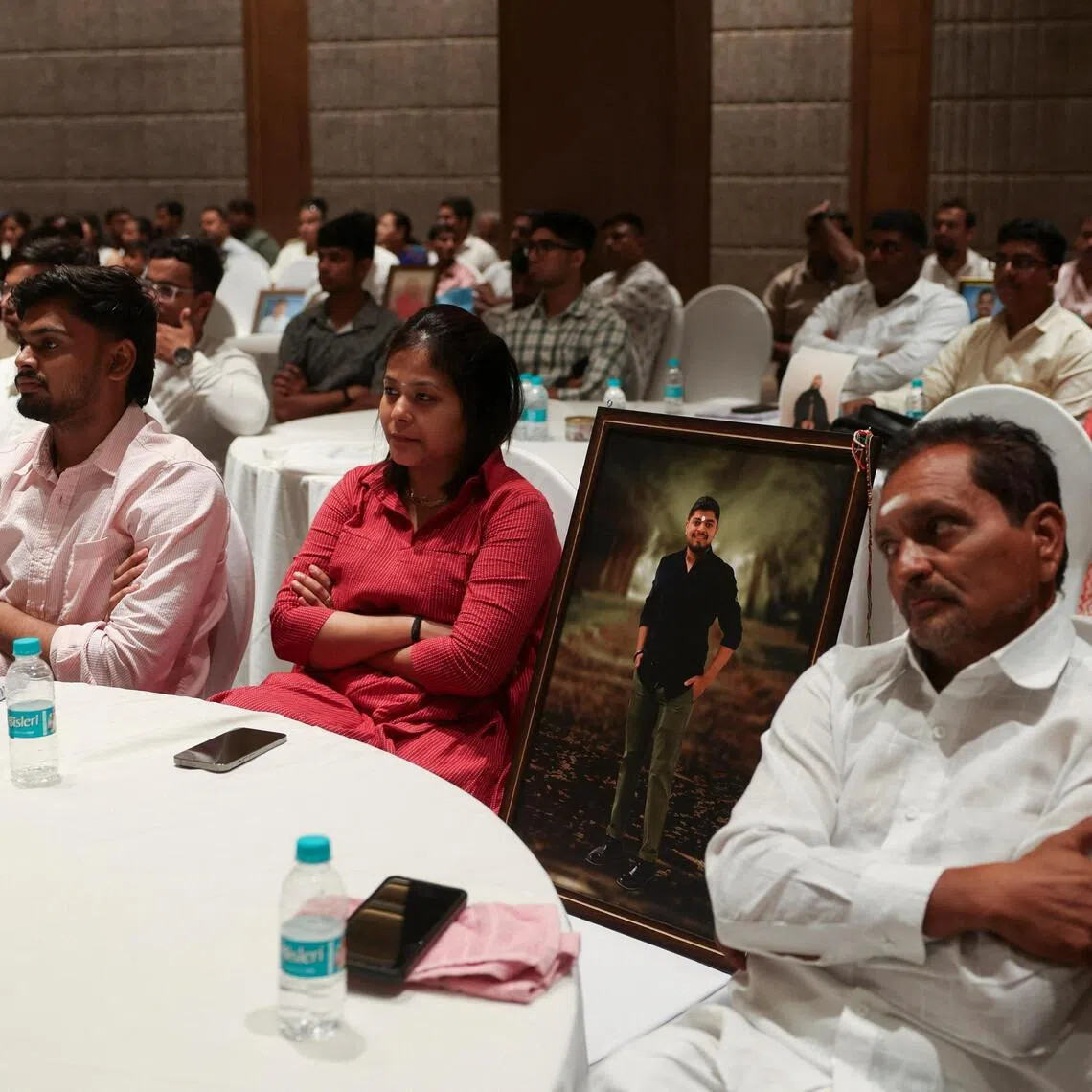 Family members of the victims of Air India Boeing 787-8 Dreamliner crash on June 12, 2025, attend a gathering during the first anniversary in Ahmedabad, India, on June 12, 2026.