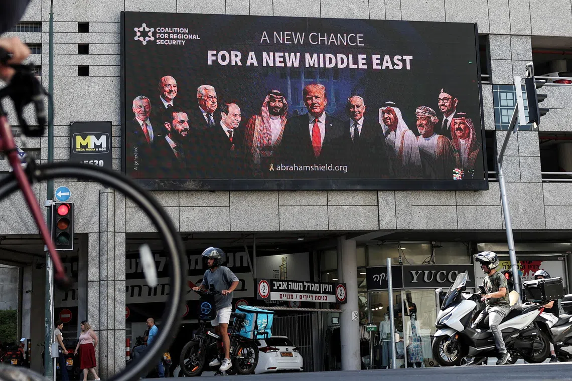 A billboard sponsored by the Coalition for Regional Security calling for the expansion of the Abraham Accords, in Ramat Gan in Israel on June 26.