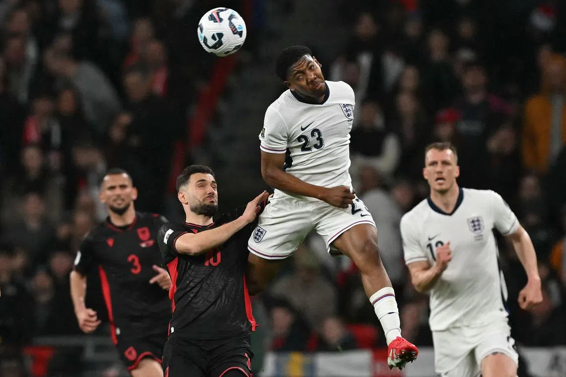 England's defender Myles Lewis-Skelly wins a header during the World Cup Group K qualifier football match between England and Albania at Wembley stadium.