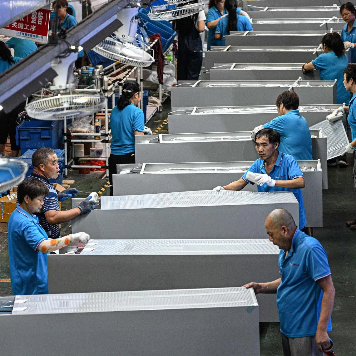 A refrigerator assembly line at a Chinese factory in Jiangsu province. Under the incoming Trump administration in the US, China is expected to face significantly higher tariffs than other countries.