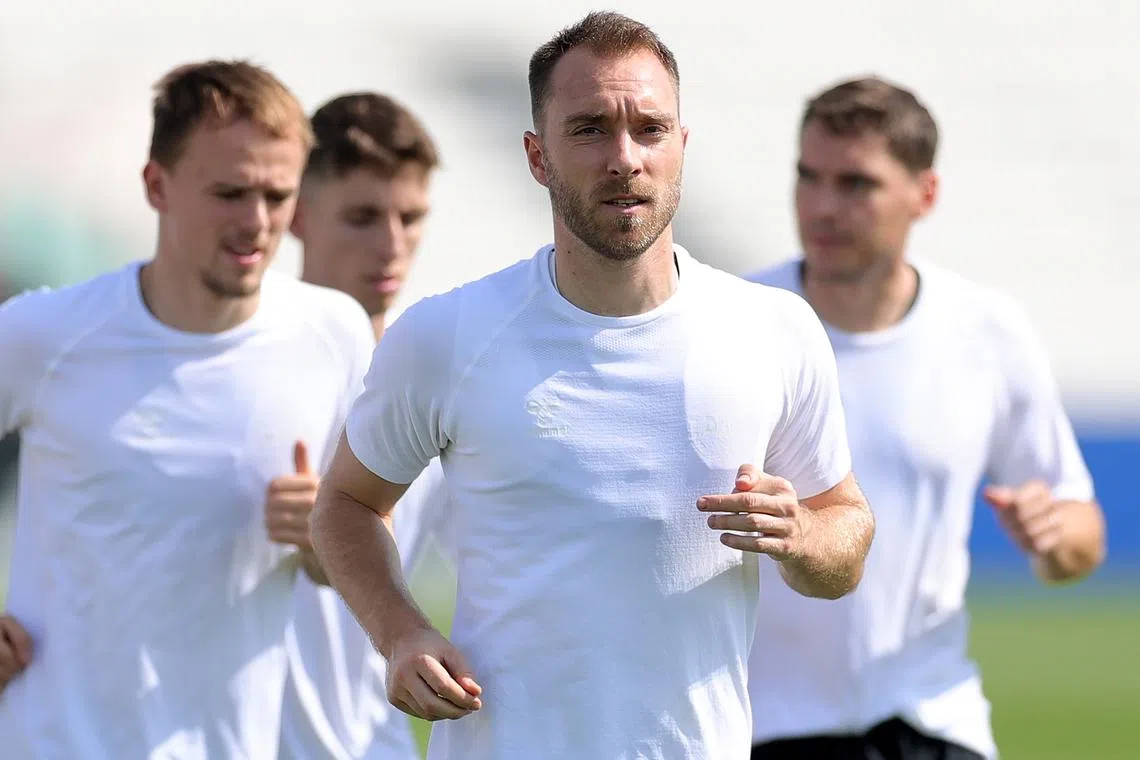 Denmark midfielder Christian Eriksen and his teammates in  training ahead of their first World Cup match against Tunisia on Nov 22.