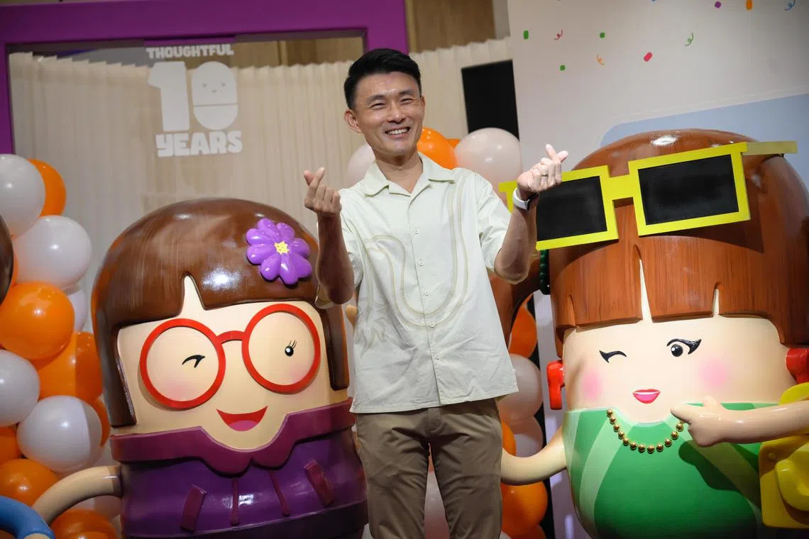 Mr Baey Yam Keng, the Senior Parliamentary Secretary for Transport of Singapore, pictured with the Thoughtful Bunch sculptures at Northpoint City on Oct 11, 2024. The sculptures were launched in conjunction with the 10th anniversary of the Thoughtful Bunch- Stand-up Stacey, Move-In Martin, Give-Way Glenda, Bag-Down Benny and Hush-Hush Hannah.