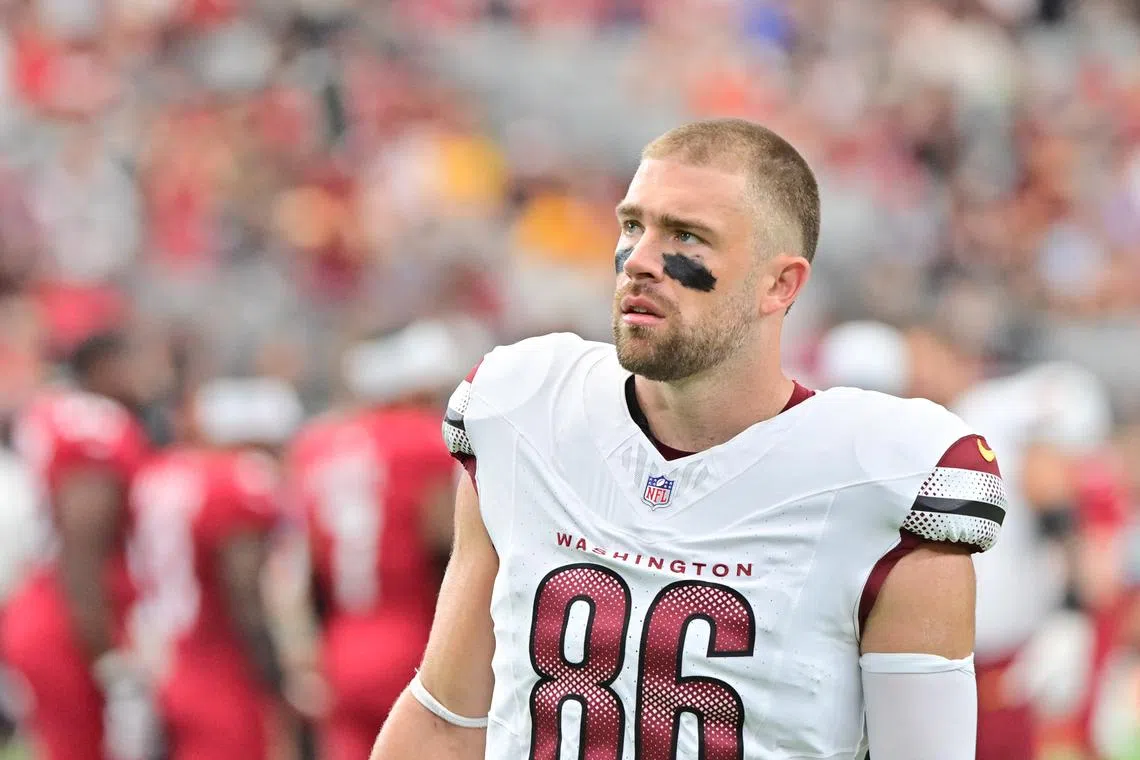 FILE PHOTO: Sep 29, 2024; Glendale, Arizona, USA;  Washington Commanders tight end Zach Ertz (86) looks on in the first half against the Arizona Cardinals at State Farm Stadium. Mandatory Credit: Matt Kartozian-Imagn Images/File Photo