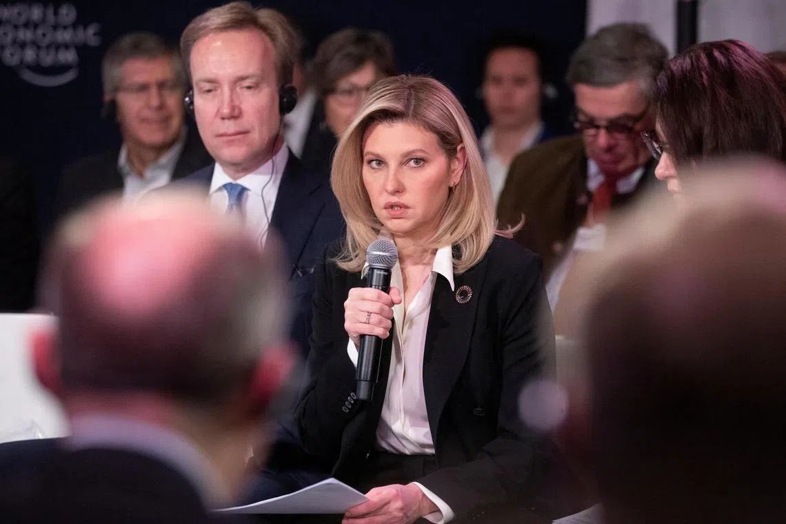 WEF president Borge Brende sits beside Ukraine's first lady, Olena Zelenska, as she addresses CEOs at the World Economic Forum in  Davos, Switzerland, on Jan 18, 2023.