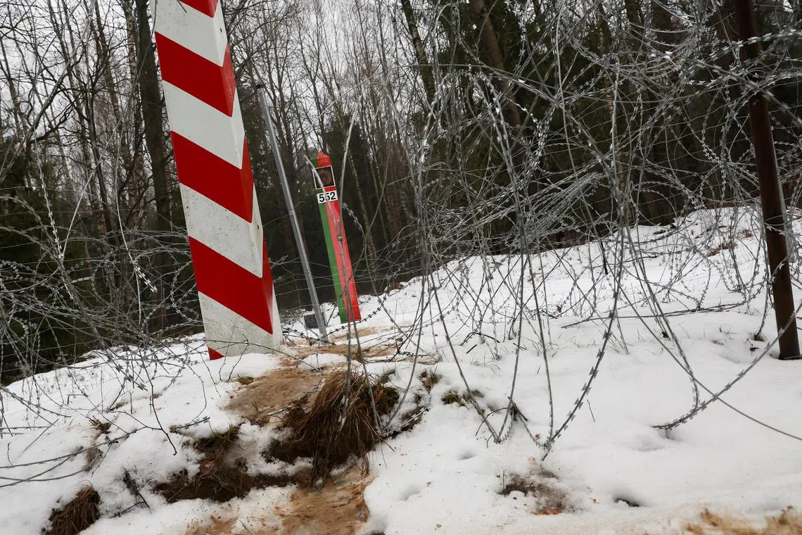 Polish and Belarusian border posts are seen at the border, in Tolcze near Kuznica, Poland.