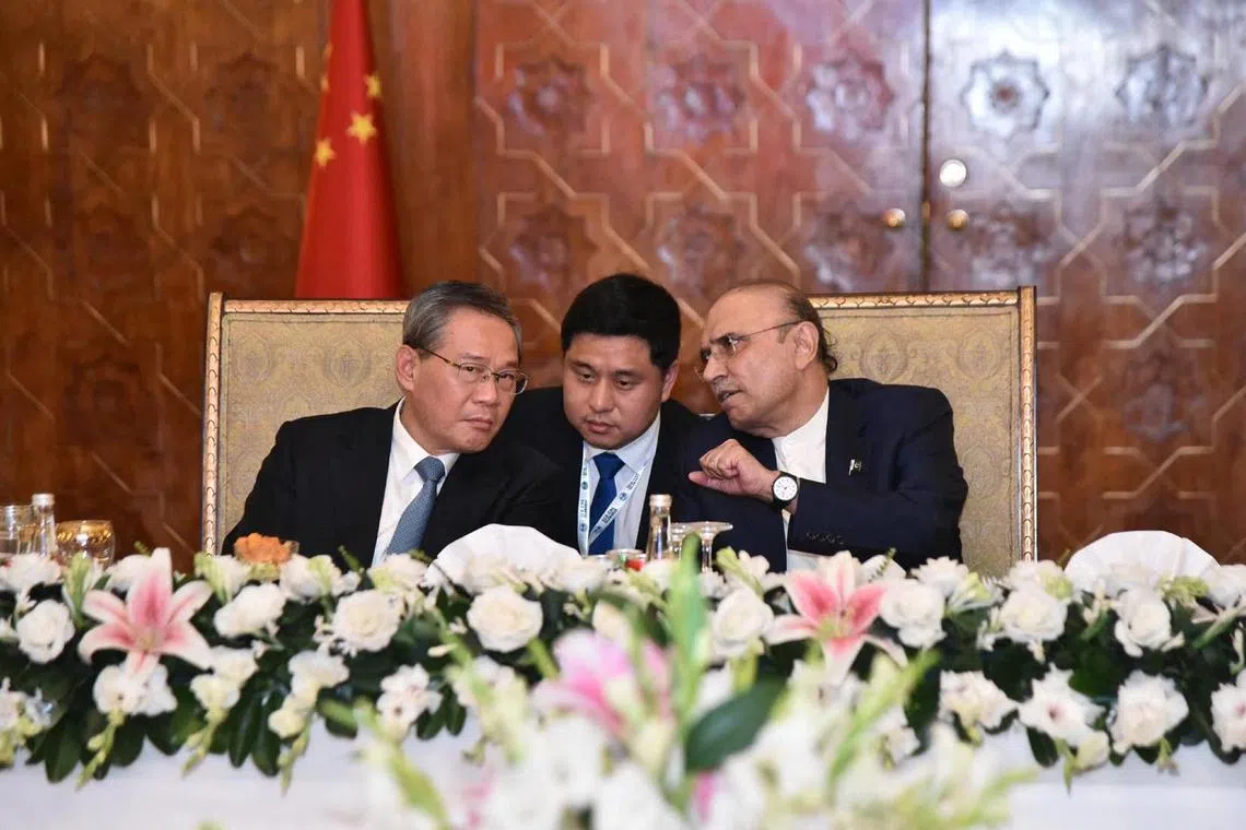 Pakistani President Asif Ali Zardari and Chinese Premier Li Qiang at state luncheon in Islamabad on Oct 15.