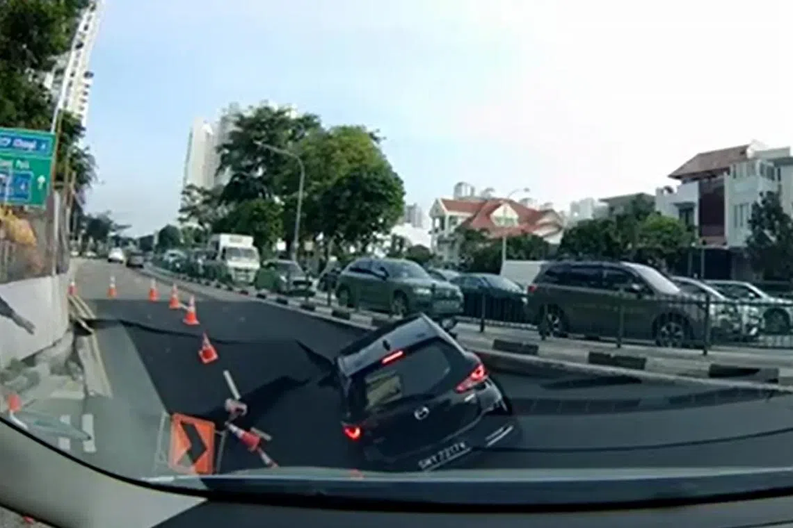 The sinkhole formed after a failure at a nearby worksite, causing a car and its driver to fall into it on July 26, 2025.