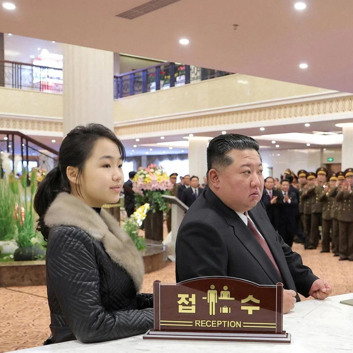 There are signs Kim Ju Ae (left) is providing input on policy matters.