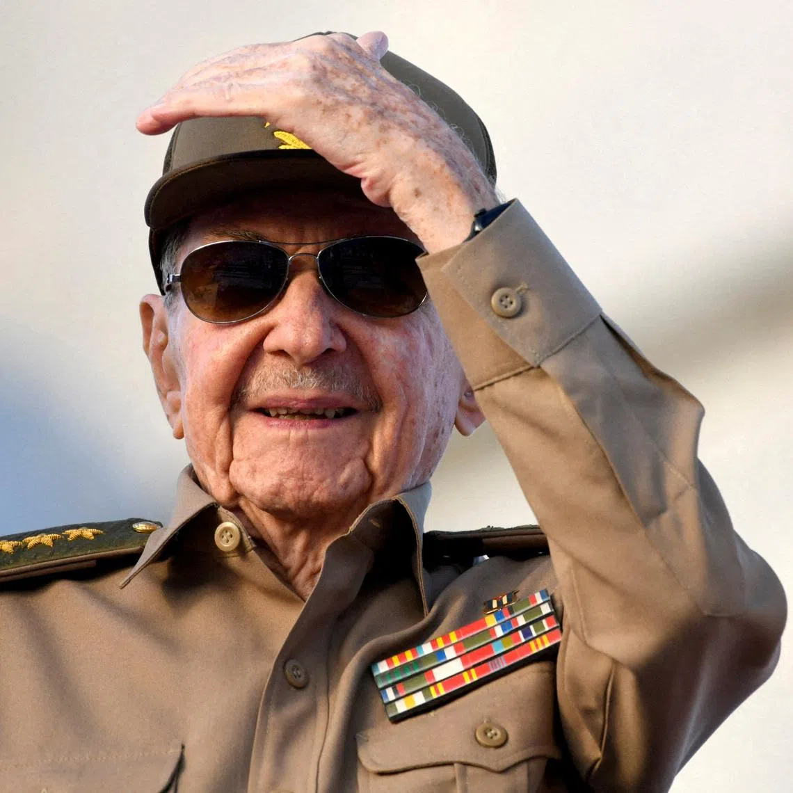 FILE PHOTO: Cuba's former President Raul Castro watches a May Day rally in Havana, Cuba May 1, 2025. REUTERS/Norlys Perez/File Photo