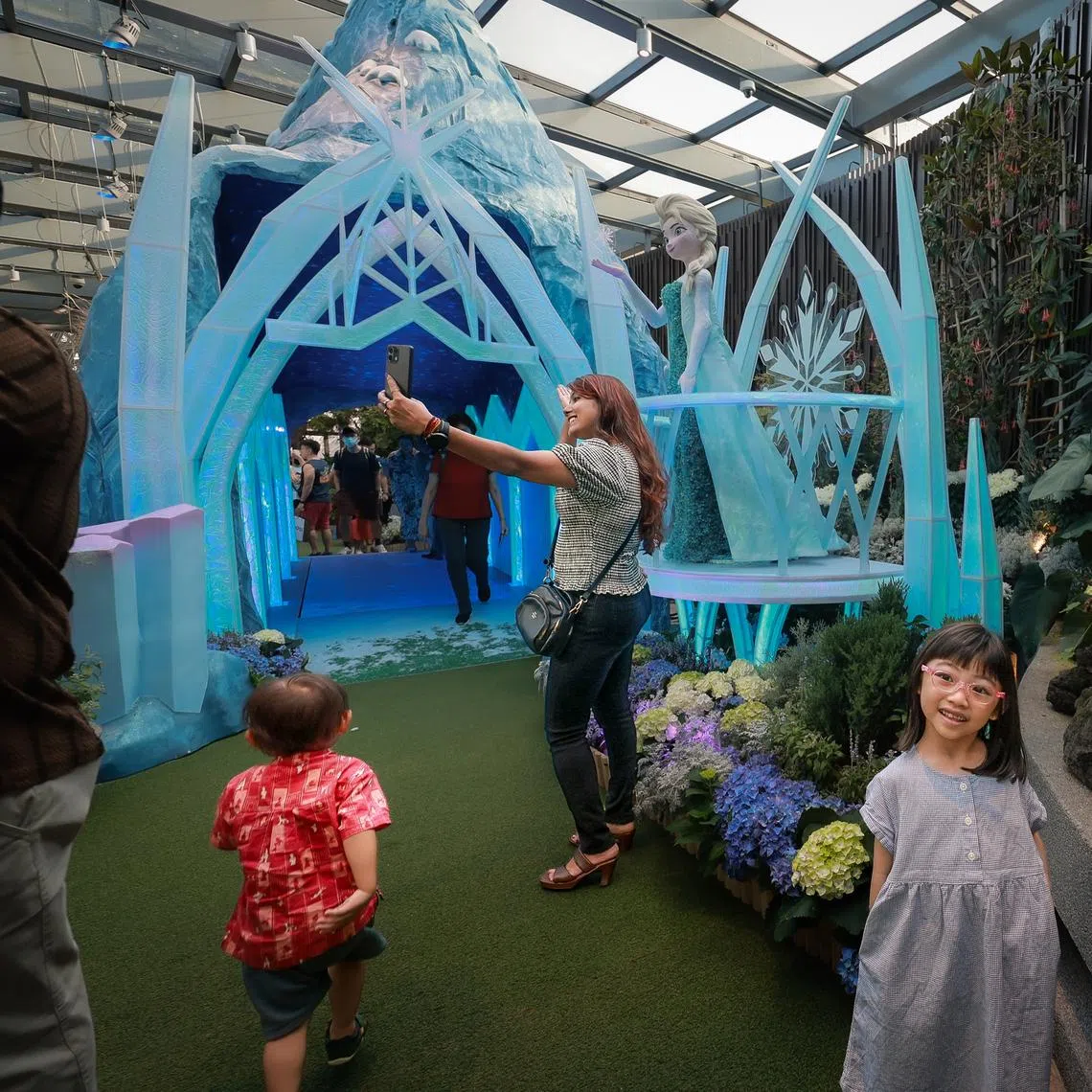 Visitors exploring the Disney Garden of Wonder at Gardens by the Bay on June 20.