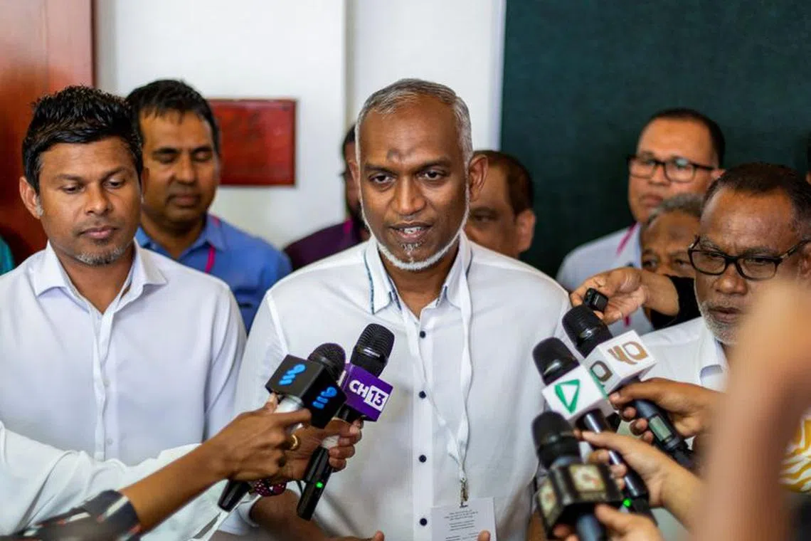 FILE PHOTO: Mohamed Muizzu, Maldives presidential candidate of the opposition party, People's National Congress speaks with the media personnel during the second round of a presidential election in Male, Maldives September 30, 2023. REUTERS/Dhahau Naseem/File Photo
