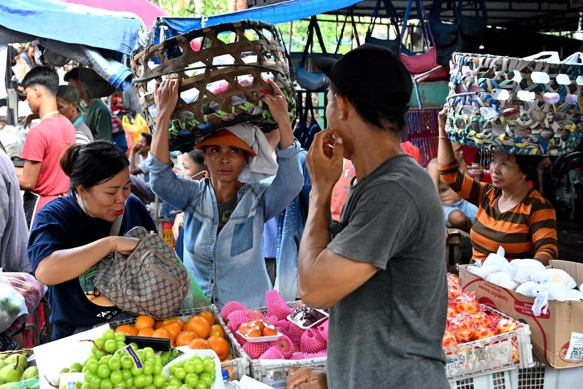 Businesses selling everything from pizzas to cars have been hit by Indonesia’s shrinking middle class.