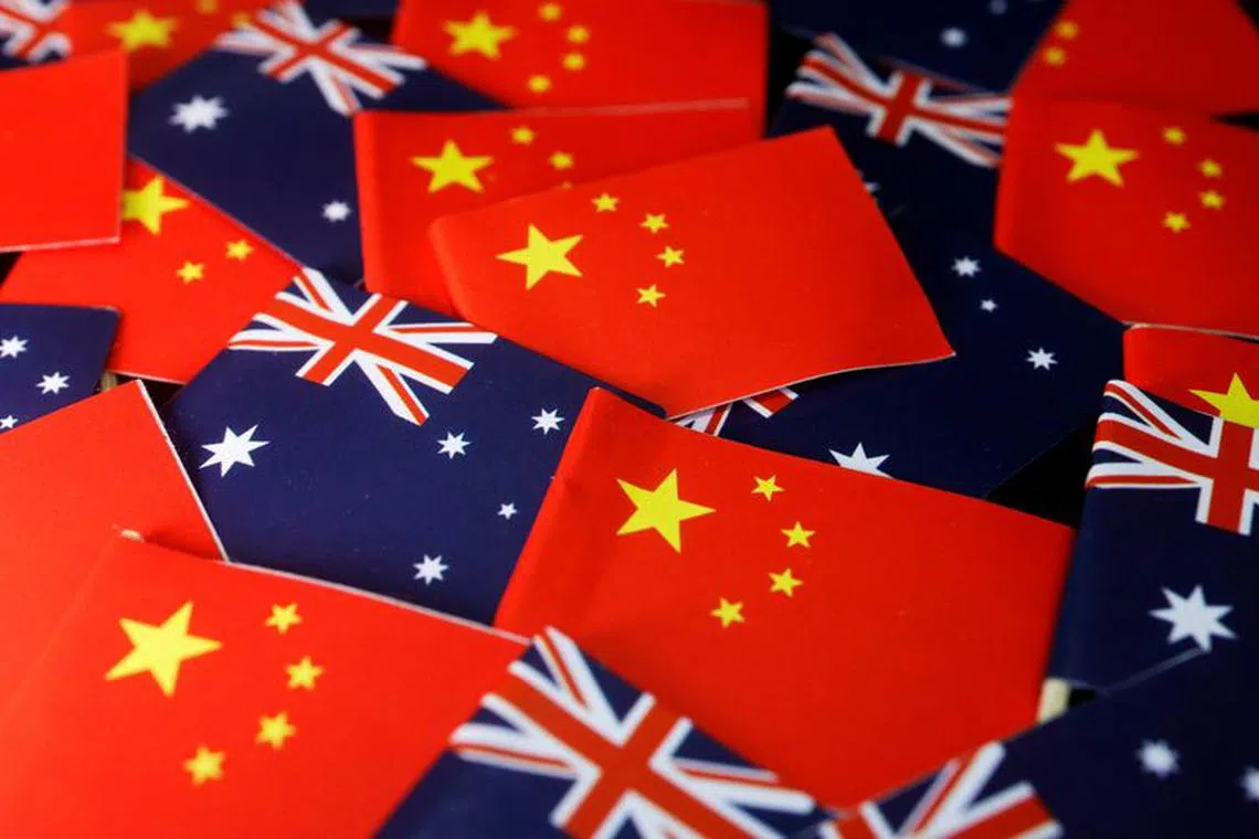 Flags of Australia and China are displayed in this illustration picture taken May 11, 2023. REUTERS/Florence Lo/Illustration