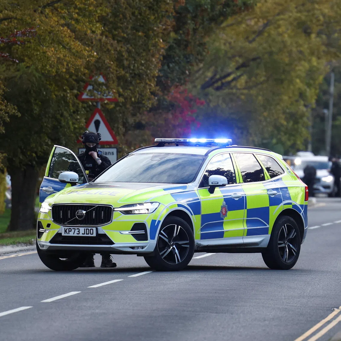Police blocking a road near the US Fairford air base in south-west England on Sept 27.