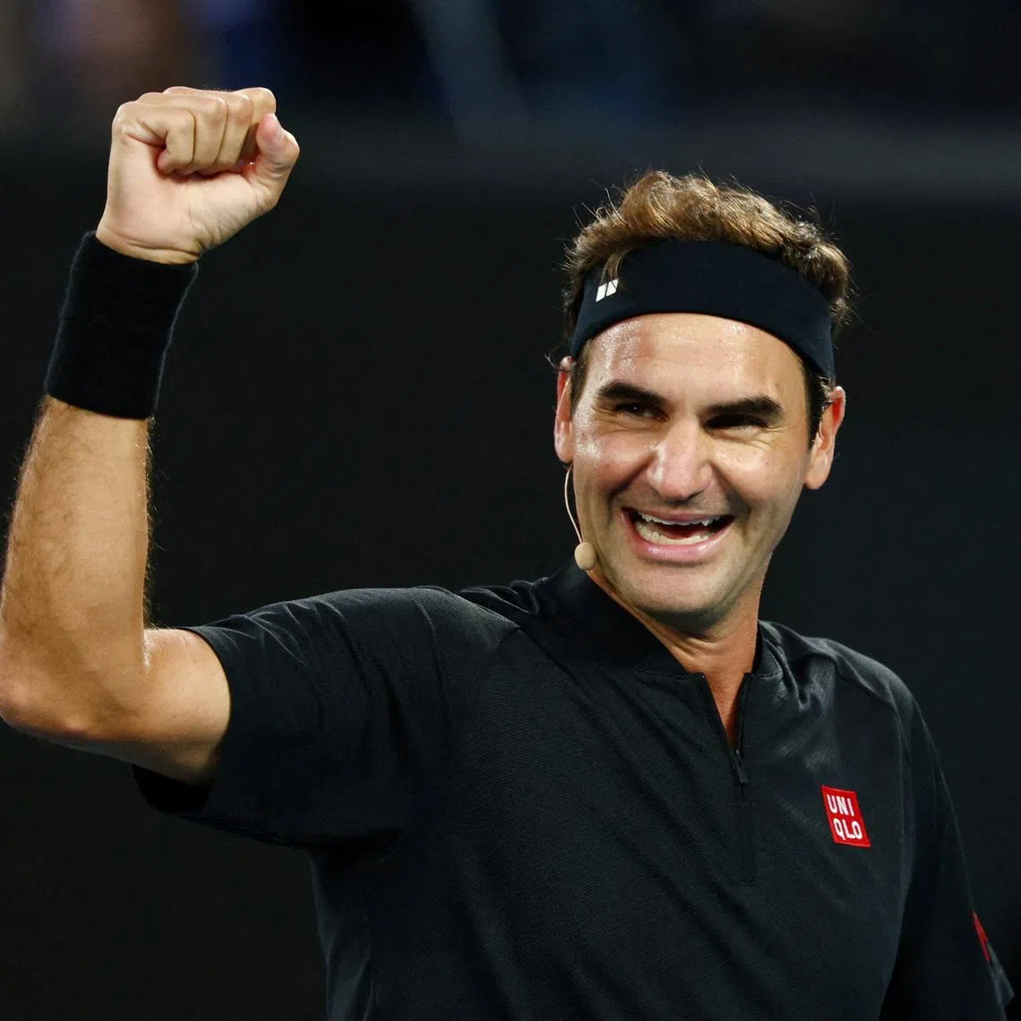 Tennis legend Roger Federer reacts during an exhibition match at the Australian Open in January 2026.