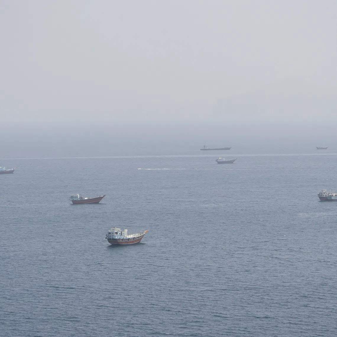 Vessels near the Strait of Hormuz, as seen from Musandam, Oman, on Sept 2.