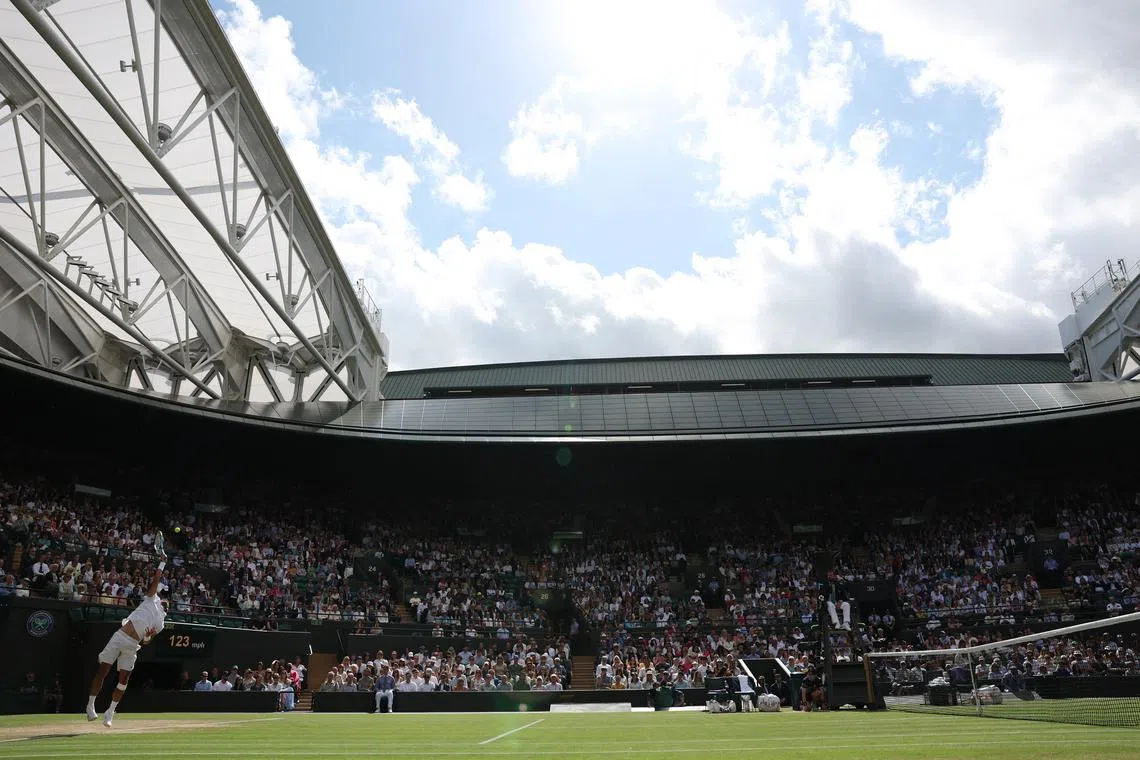 FILE PHOTO: Tennis - Wimbledon - All England Lawn Tennis and Croquet Club, London, Britain - July 10, 2024 Italy's Lorenzo Musetti in action during his quarter final match against Taylor Fritz of the U.S. REUTERS/Isabel Infantes/File Photo