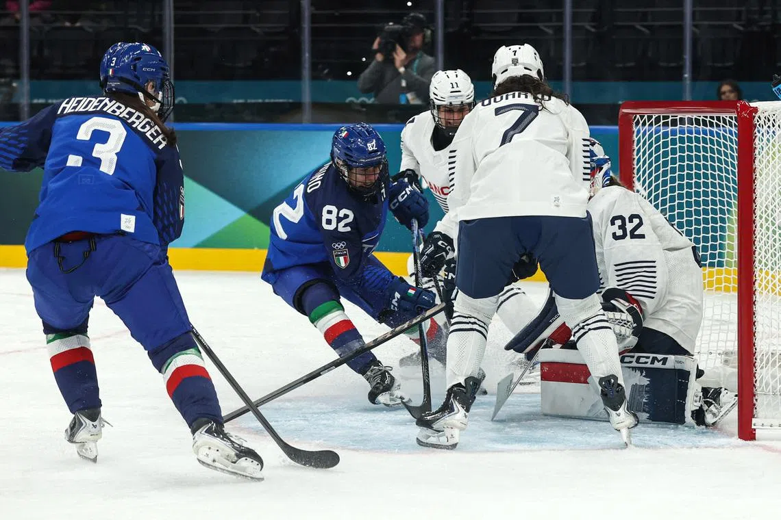 Milano Cortina 2026 Olympics - Ice Hockey - Women's Preliminary Round - Group B - Italy vs France - Milano Santagiulia Ice Hockey Arena, Milan, Italy - February 05, 2026. Kayla Tutino of Italy scores their first goal REUTERS/Mike Segar