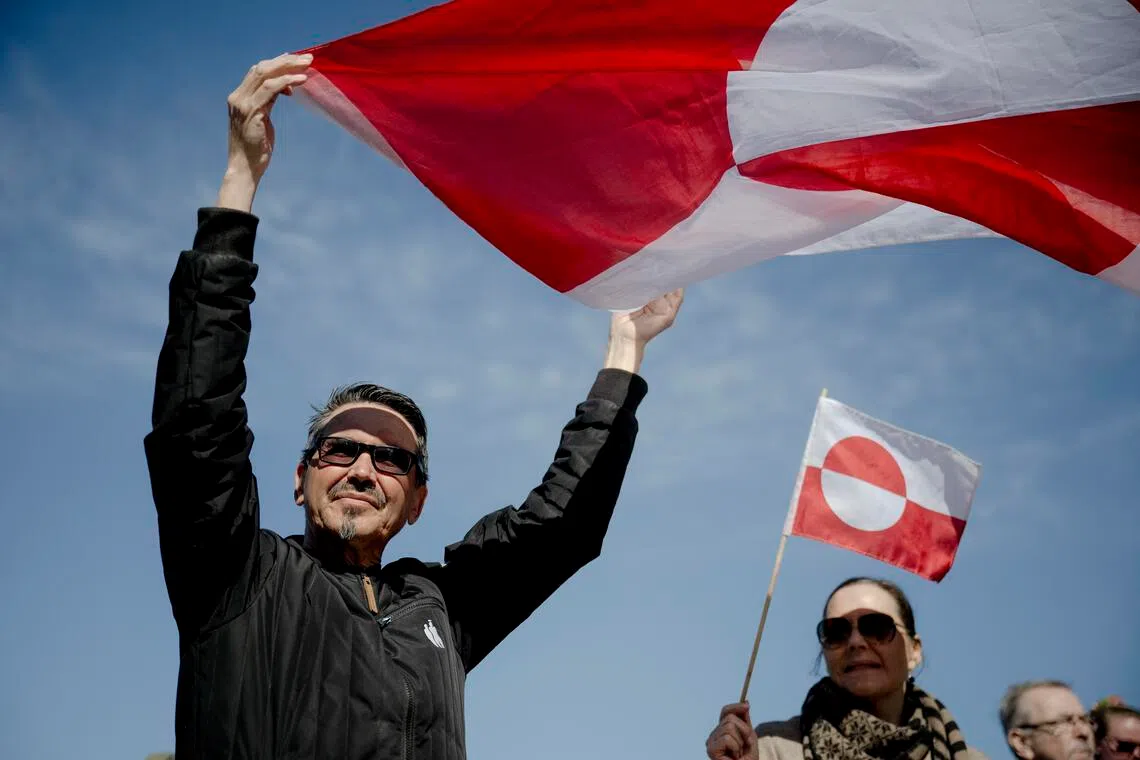 Demonstrators protesting outside the new US consulate in Nuuk, Greenland, on May 21.
