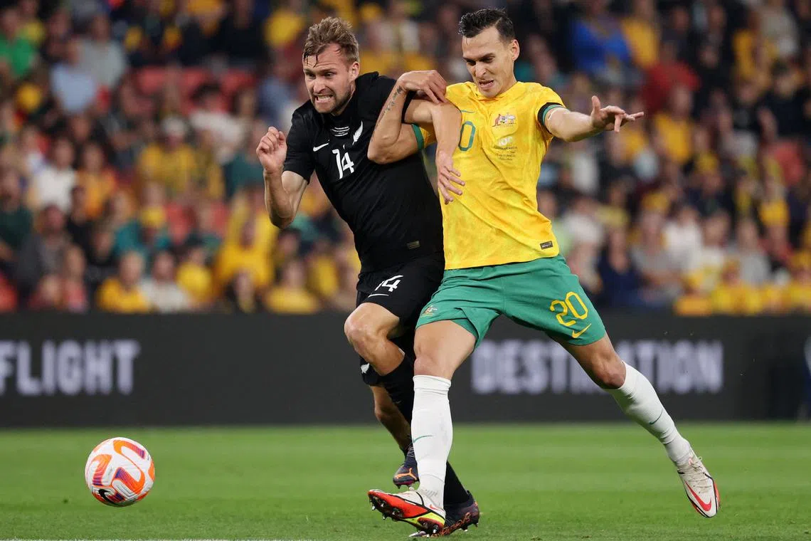 FILE PHOTO: Soccer Football - International Friendly - Australia v New Zealand - Suncorp Stadium, Brisbane, Australia - September 22, 2022 Australia's Trent Sainsbury in action with New Zealand's Andre de Jong REUTERS/Loren Elliott