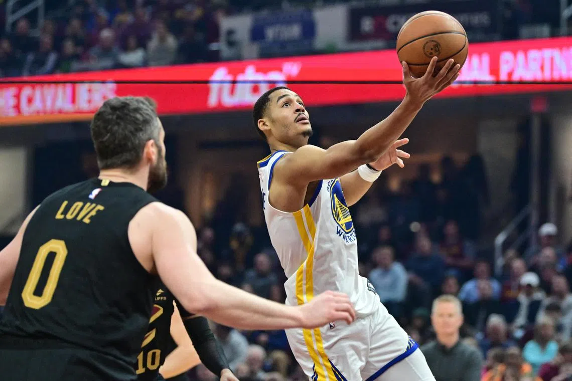 Warriors guard Jordan Poole driving to the basket against the Cleveland Cavaliers during their NBA clash on Friday. 