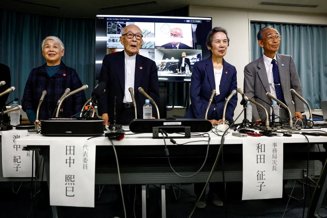 Atomic bomb survivors and members of Nihon Hidankyo, a country-wide organisation of atomic and hydrogen bomb sufferers, including Assistant Secretary General Toshiko Hamanaka, Co-chairperson Terumi Tanaka, Assistant Secretary General Masako Wada, Assistant Secretary General Jiro Hamasumi attend a press conference on the following day of Nihon Hidankyo winning the 2024 Nobel Peace Prize, in Tokyo, Japan, October 12, 2024.  REUTERS/Issei Kato