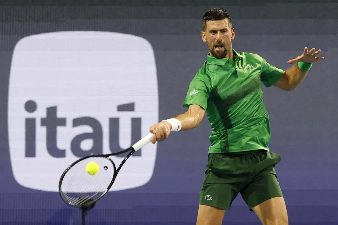 Mar 25, 2025; Miami, FL, USA; Novak Djokovic (SRB) hits a forehand against Lorenzo Musetti (ITA)(not pictured) on day eight of the Miami Open at Hard Rock Stadium. Mandatory Credit: Geoff Burke-Imagn Images