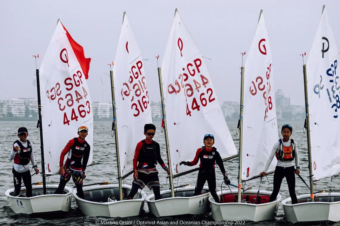 Singapore's junior sailors Amos Tham (from left), Ian Goh, Eitan Oh, Ethan Chia, and Nicole Quek posing for a photo at the IODA Asian and Oceanian Championship.