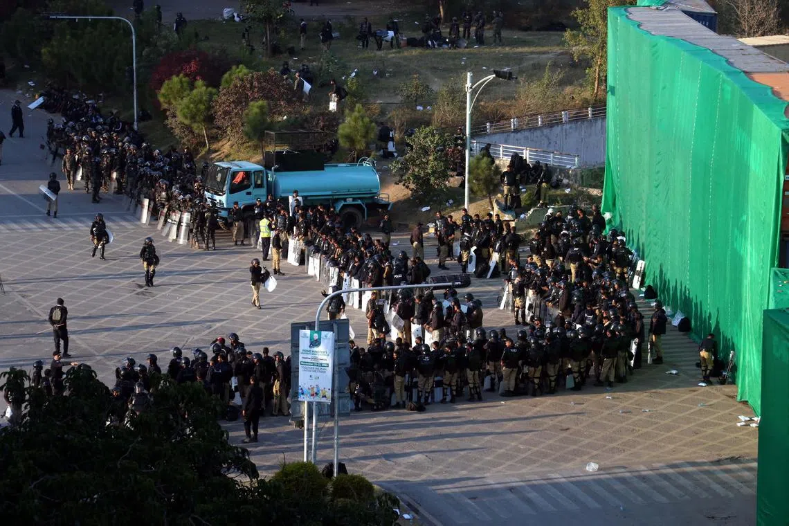 Police take positions as supporters of Imran Khan's party continued the protest for the second day, demanding the release of Khan.