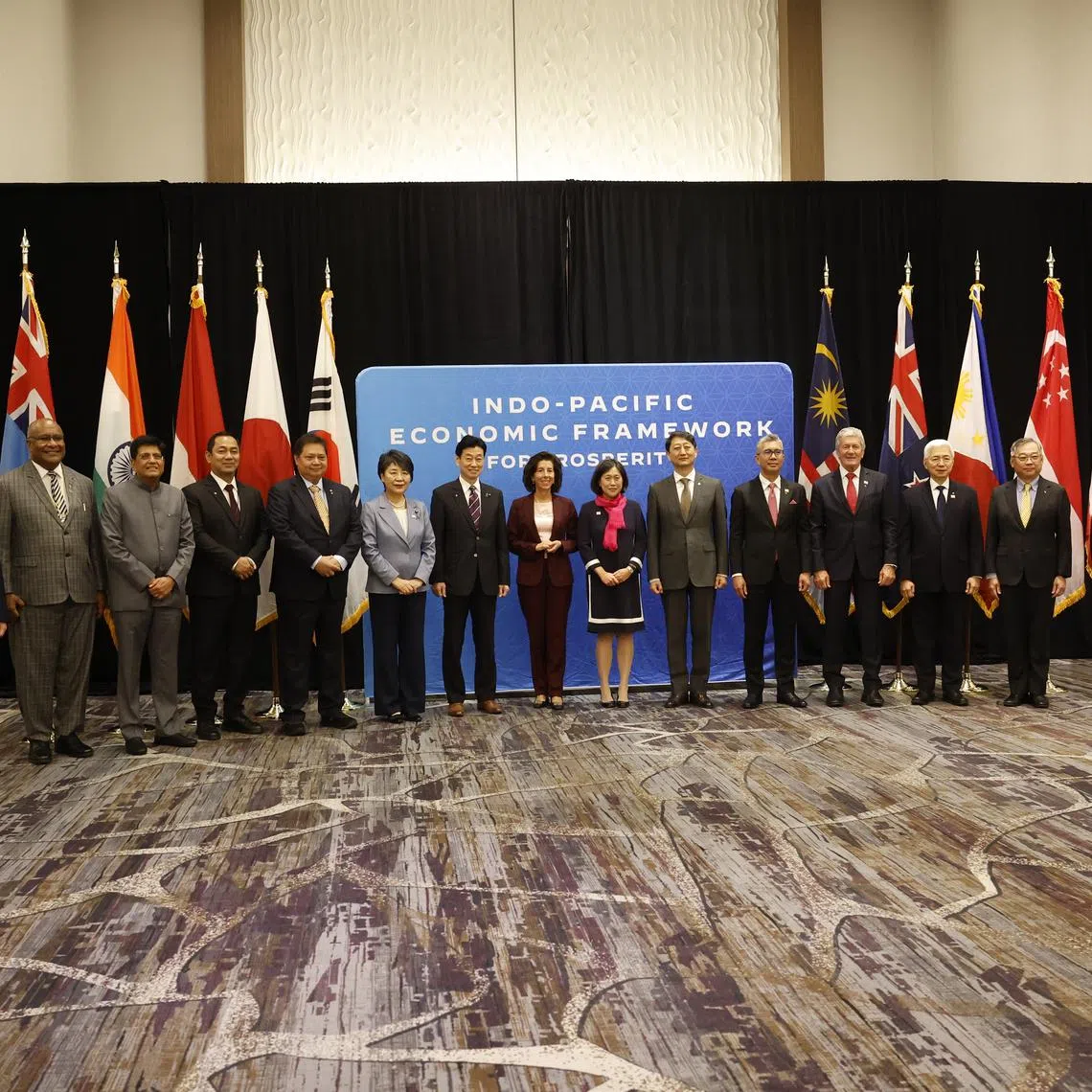 Minister for Trade and Industry Gan Kim Yong (third from right) posing with other delegates for a family photo during a ministerial meeting at the Apec summit in San Francisco on Nov 14.