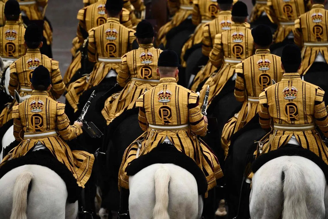 Members of the Household Cavalry Mounted Band taking part in the 'King's Procession', a journey of two kilometres from Buckingham Palace to Westminster Abbey in central London on May 6, 2023, ahead of the coronations of Britain's King Charles III and Britain's Camilla, Queen Consort. 