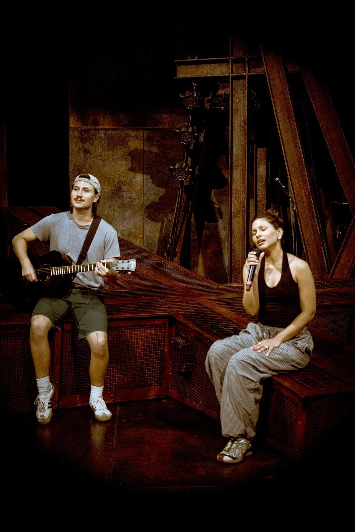Singapore singer Tabitha Nauser (right), with ensemble cast member Thomas McFerran (left), at the Jesus Christ Superstar rehearsals in Hong Kong.