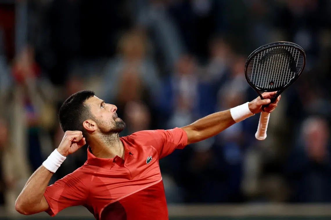 Tennis - French Open - Roland Garros, Paris, France - May 28, 2024  Serbia's Novak Djokovic reacts after winning his first round match against France's Pierre-Hugues Herbert REUTERS/Lisi Niesner