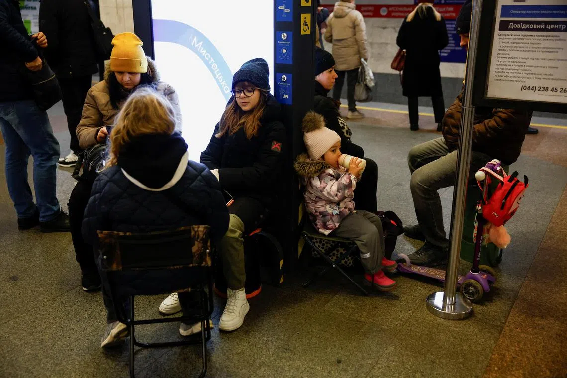 People take shelter during a Russian missile and drone attack, amid Russia's attack on Ukraine, in Kyiv, Ukraine on Nov 13, 2024.